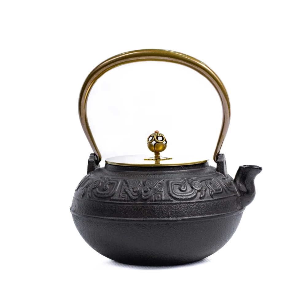 Чугунный чайник круглый